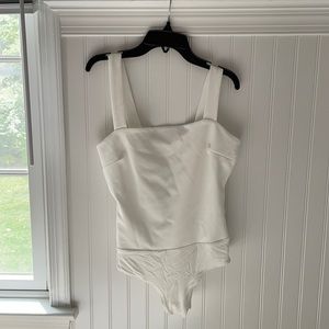 Lulu’s White Bodysuit.